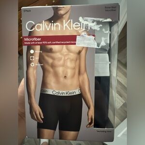 Gray and black Calvin boxerbriefs size large